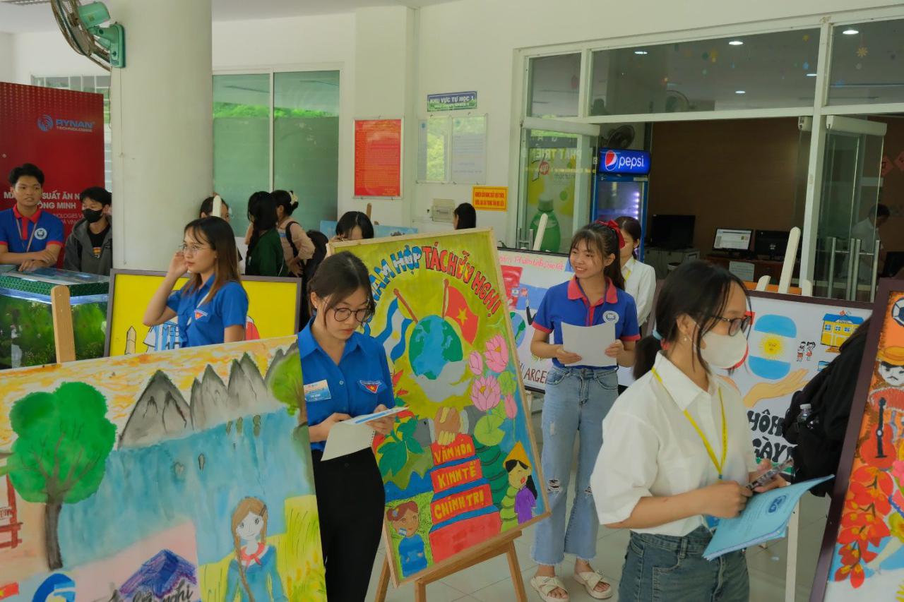 A group of people in a room Description automatically generated