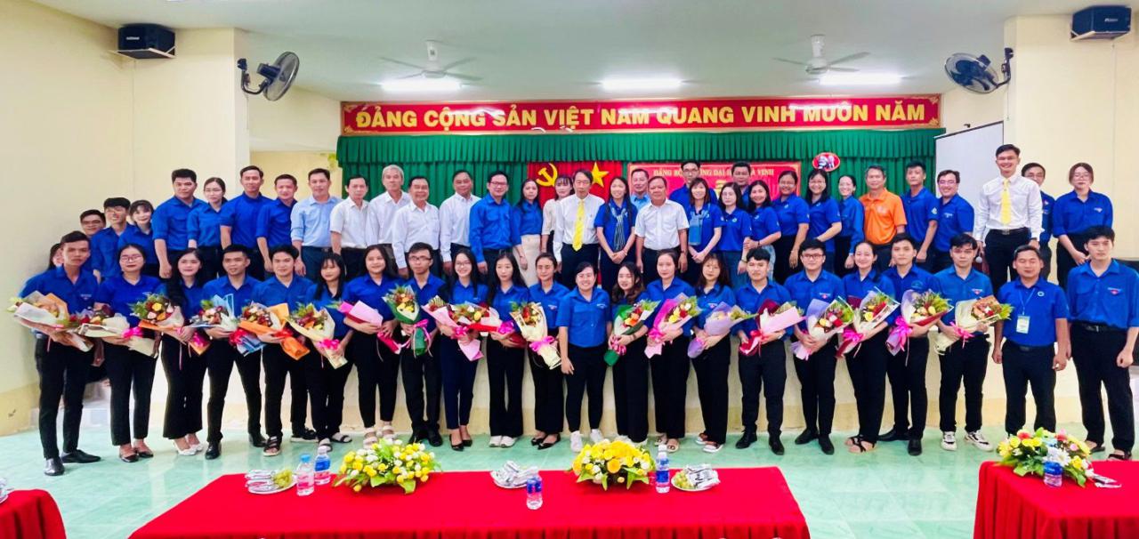 A group of people posing for a photo Description automatically generated