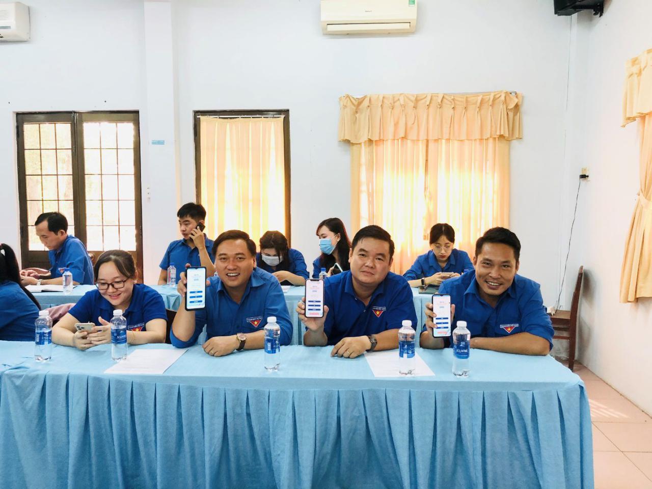 A group of people sitting at a table Description automatically generated