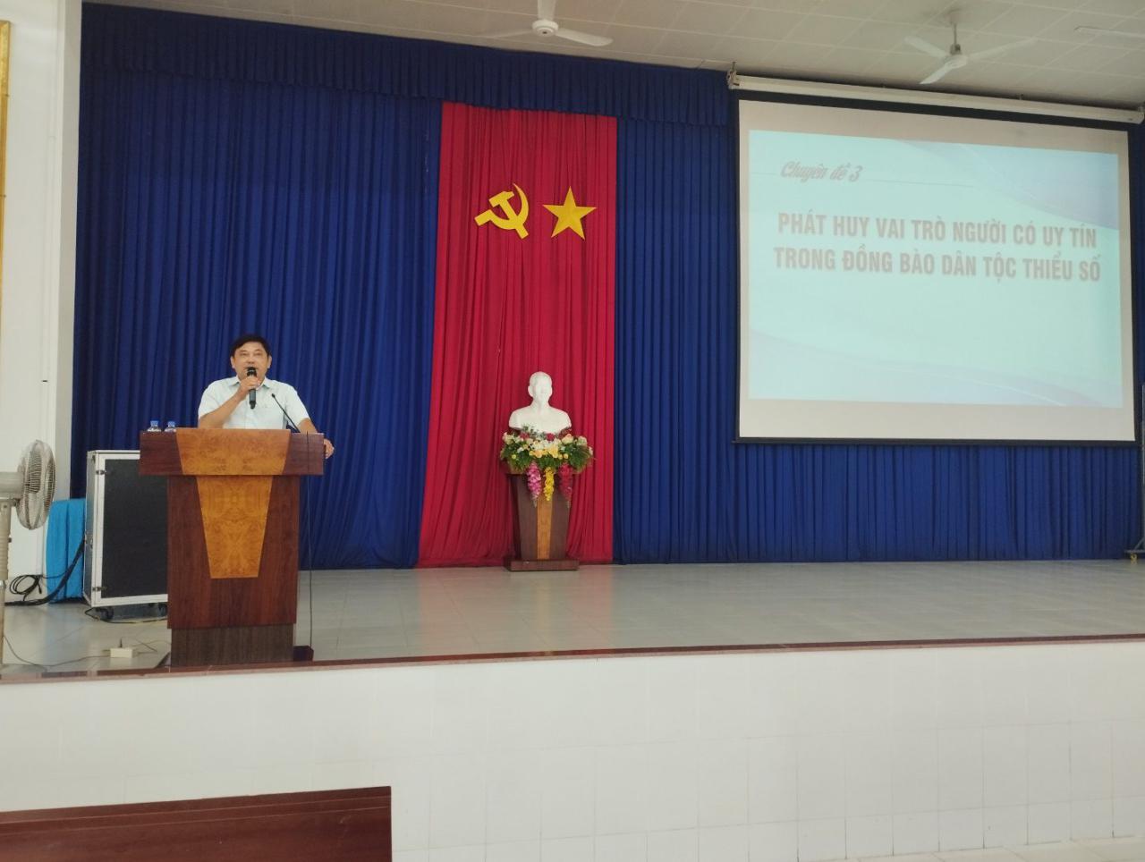 A person standing at a podium
Description automatically generated with low confidence