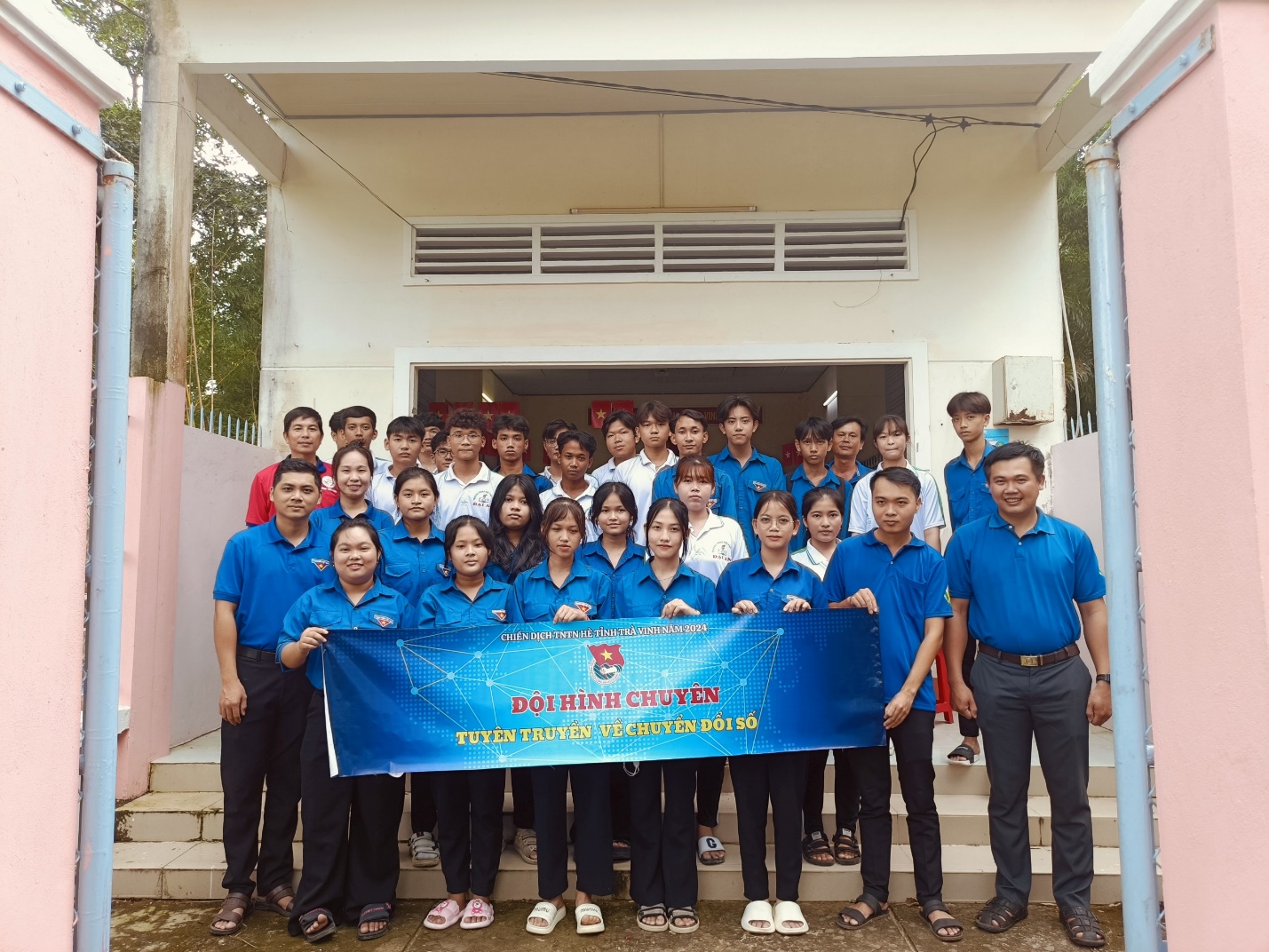 A group of people posing for a photo Description automatically generated